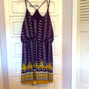 Purple, white, and gold dress.